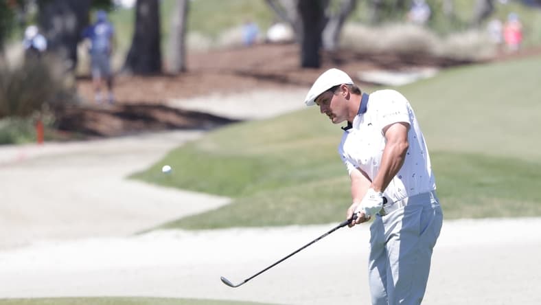 May 20, 2021; Kiawah Island, South Carolina, USA; Bryson DeChambeau chips onto the 1st green during the first round of the PGA Championship golf tournament. Mandatory Credit: Geoff Burke-USA TODAY Sports