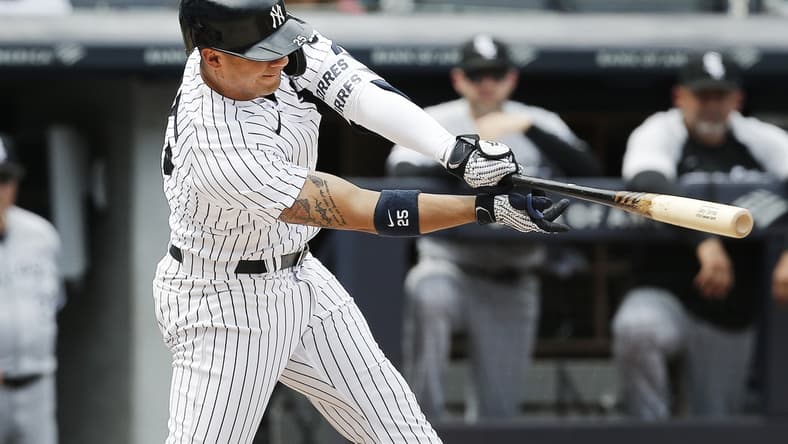 May 22, 2021; Bronx, New York, USA; New York Yankees shortstop Gleyber Torres (25) hits a two run single against the Chicago White Sox during the fifth inning at Yankee Stadium. Mandatory Credit: Andy Marlin-USA TODAY Sports
