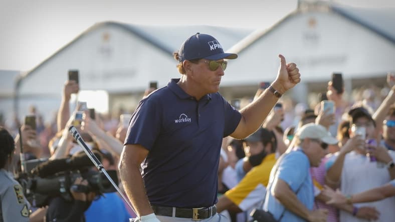 May 23, 2021; Kiawah Island, South Carolina, USA; Phil Mickelson gives a thumbs up to the fans on the 18th green during the final round of the PGA Championship golf tournament. Mandatory Credit: Geoff Burke-USA TODAY Sports