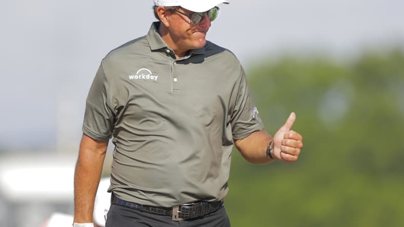 May 27, 2021; Fort Worth, Texas, USA; Phil Mickelson on the 14th tee during the first round of the Charles Schwab Challenge golf tournament. Mandatory Credit: Erich Schlegel-USA TODAY Sports