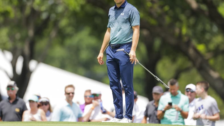 May 27, 2021; Fort Worth, Texas, USA; Jordan Spieth lines up his putt on #6 during the first round of the Charles Schwab Challenge golf tournament. Mandatory Credit: Erich Schlegel-USA TODAY Sports