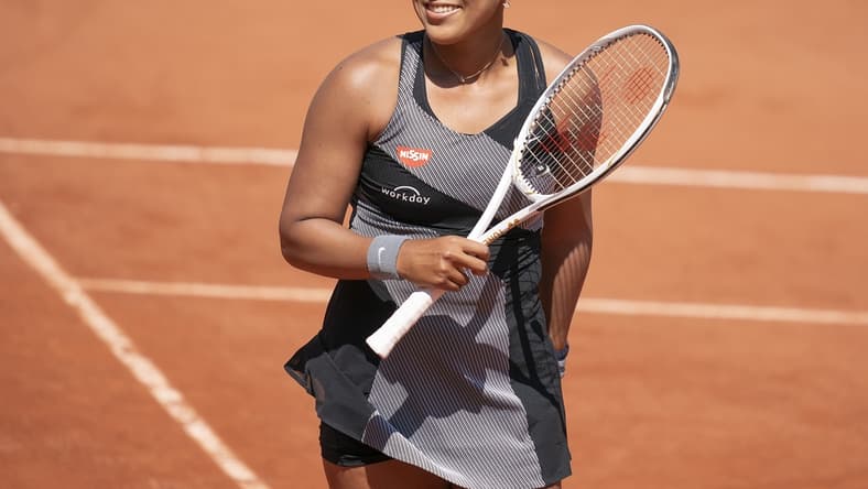 May 30, 2021; Paris, France; Naomi Osaka (JPN) reacts during her match against Patricia Maria Tig (ROU) at Roland Garros Stadium. Mandatory Credit: Susan Mullane-USA TODAY Sports