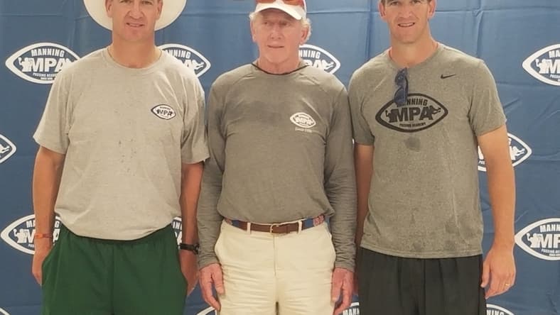 Left to right: Peyton Manning, Archie Manning and Eli Manning pose at the 24th Annual Manning Passing Academy on June 28, 2019.

Archie Manning Eli Peyton MPA 2019