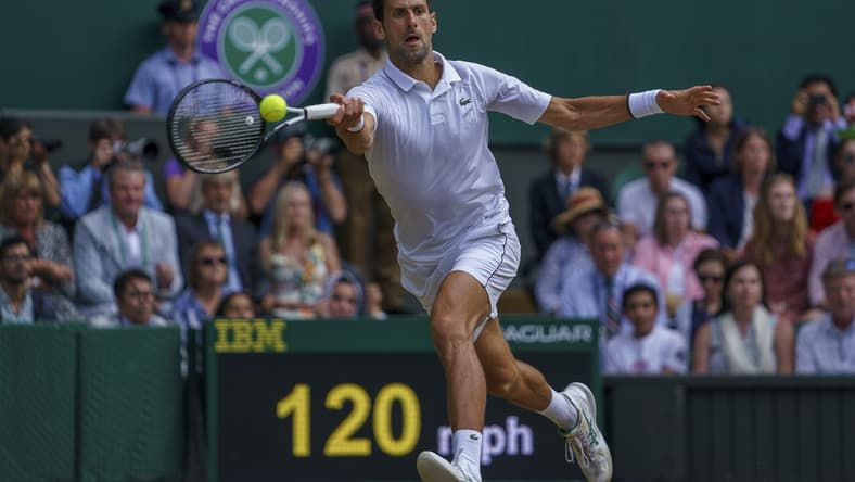 Jul 14, 2019; London, United Kingdom; Novak Djokovic (SRB) in action during the mens final match against Roger Federer (SUI) on day 13 at the All England Lawn and Croquet Club. Mandatory Credit: Susan Mullane-USA TODAY Sports