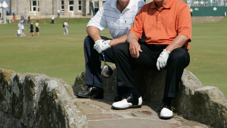 July 12, 2005; St. Andrews, Scotland; British Open practice -- British Open practice round partners Tom Watson and Jack Nicklaus pause to pose for for photographs on the Swilcan Bridge at St. Andrews.  Nicklaus has said this will be his last British Open and last major tournament. Mandatory Credit: H. Darr Beiser/USA TODAY NETWORK