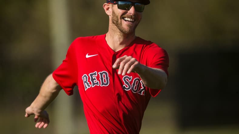 Chris Sale, a pitcher for the Boston Red Sox baseball team warms up during the first day Spring Training for the full squad at Jet Blue Park in Fort Myers on Monday, February 22, 2021. He is recovering from Tommy John surgery and is it is uncertain when he is returning.
Salesmiling