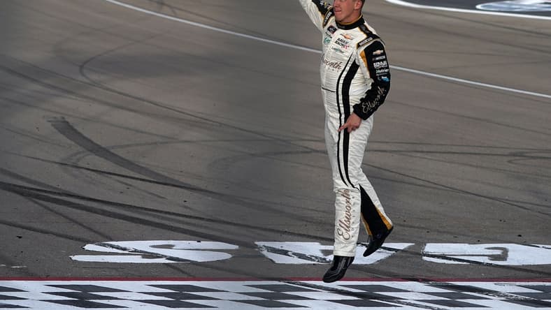 Mar 6, 2021; Las Vegas, NV, USA; NASCAR Xfinity Series driver AJ Allmendinger (16) celebrates his victory in the Alsco Uniforms 300 at Las Vegas Motor Speedway. Mandatory Credit: Gary A. Vasquez-USA TODAY Sports