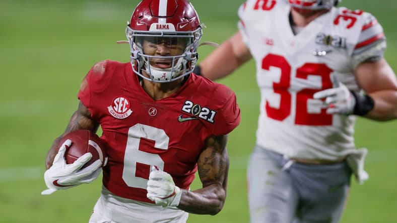 Alabama receiver DeVonta Smith catches a 42-yard touchdown behind Ohio State linebacker Tuf Borland during the second quarter of the College Football Playoff National Championship Game, Jan. 11, 2021 in Miami Gardens, Fla.
Ncaa Football Cfp National Championship Ohio State Vs Alabama
