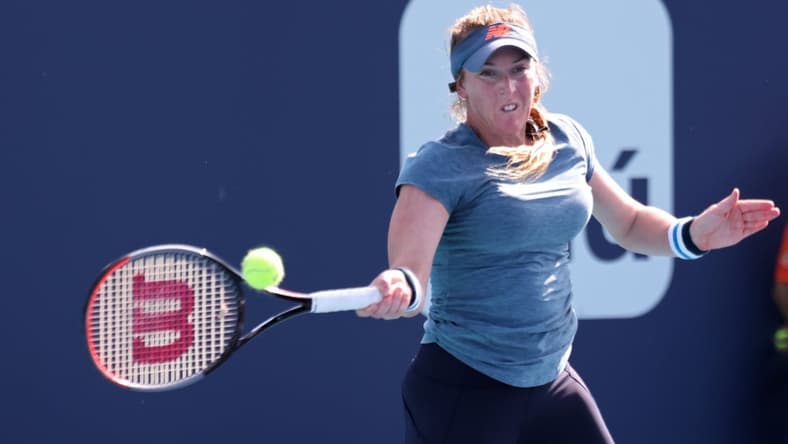 Mar 23, 2021; Miami, Florida, USA; Madison Brengle of the United States hits a forehand against Shelby Rogers of the United States (not pictured) in the first round of the Miami Open at Hard Rock Stadium. Mandatory Credit: Geoff Burke-USA TODAY Sports