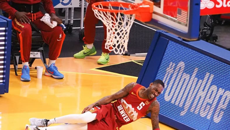 Apr 23, 2021; San Francisco, California, USA; Denver Nuggets guard Will Barton (5) lays on the court with an injury during the first quarter against the Golden State Warriors at Chase Center. Mandatory Credit: Kelley L Cox-USA TODAY Sports