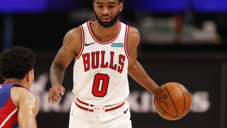 May 9, 2021; Detroit, Michigan, USA; Chicago Bulls guard Coby White (0) dribbles the ball against Detroit Pistons guard Killian Hayes (7) during the fourth quarter at Little Caesars Arena. Mandatory Credit: Raj Mehta-USA TODAY Sports