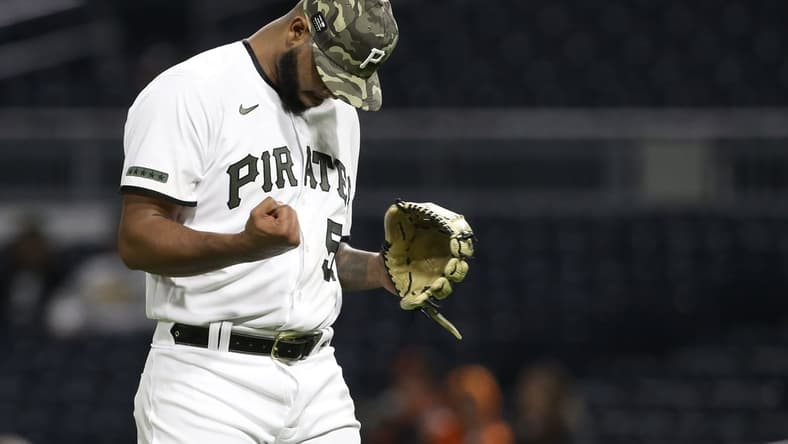 May 14, 2021; Pittsburgh, Pennsylvania, USA; Pittsburgh Pirates relief pitcher Luis Oviedo (57) reacts after pitching the eleventh inning against the San Francisco Giants at PNC Park. The Pirates won 3-2 in eleven innings. Mandatory Credit: Charles LeClaire-USA TODAY Sports