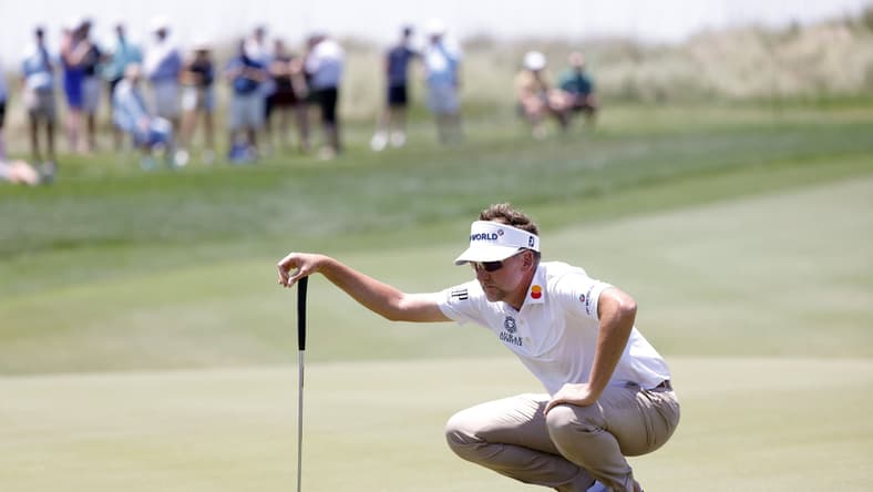 May 21, 2021; Kiawah Island, South Carolina, USA; Ian Poulter lines his putt on the fifteenth green during the second round of the PGA Championship golf tournament. Mandatory Credit: Geoff Burke-USA TODAY Sports