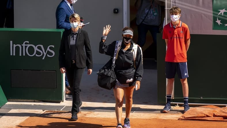 May 30, 2021; Paris, France; Naomi Osaka (JPN) enters the court for her match against Patricia Maria Tig (ROU) at Roland Garros Stadium. Mandatory Credit: Susan Mullane-USA TODAY Sports