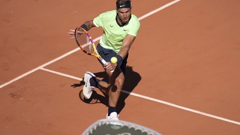 Jun 1, 2021; Paris, France; Rafael Nadal (ESP) in action during his match against Alexei Popyrin (AUS) on day three of the French Open at Roland Garros Stadium. Mandatory Credit: Susan Mullane-USA TODAY Sports