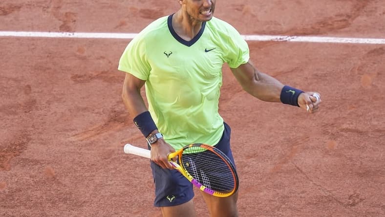 Jun 1, 2021; Paris, France; Rafael Nadal (ESP) celebrates match point during his match against Alexei Popyrin (AUS) on day three of the French Open at Roland Garros Stadium. Mandatory Credit: Susan Mullane-USA TODAY Sports