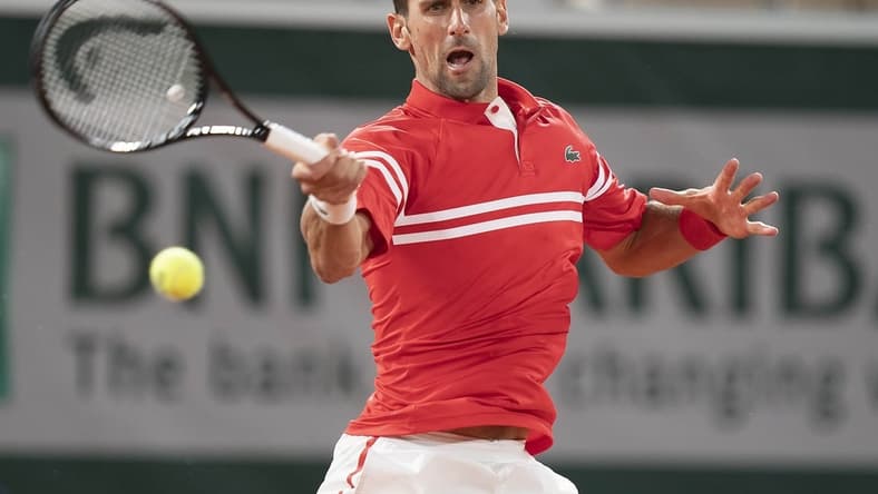 Jun 1, 2021; Paris, France; Novak Djokovic (SRB) in action during his match against Tennys Sandgren (USA) on day three of the French Open at Roland Garros Stadium. Mandatory Credit: Susan Mullane-USA TODAY Sports