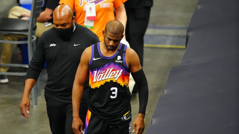 Jun 1, 2021; Phoenix, Arizona, USA; Phoenix Suns guard Chris Paul (3) leaves the game after suffering an injury against the Los Angeles Lakers in the second half during game five in the first round of the 2021 NBA Playoffs at Phoenix Suns Arena. Mandatory Credit: Mark J. Rebilas-USA TODAY Sports
