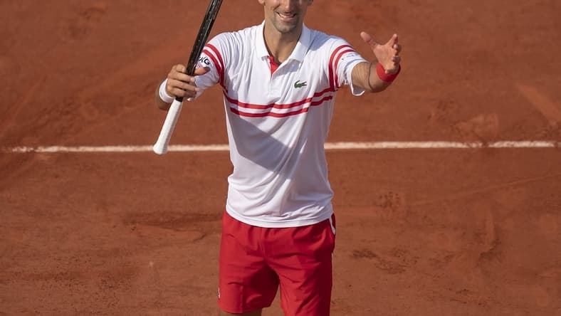 Jun 3, 2021; Paris, France; Novak Djokovic (SRB) celebrates winning his match against Pablo Cuevas (URU) on day five of the French Open at Stade Roland Garros. Mandatory Credit: Susan Mullane-USA TODAY Sports