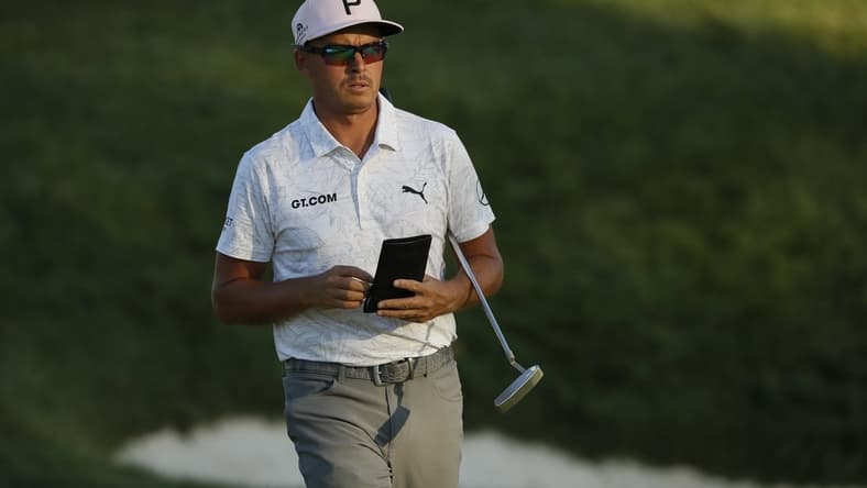 Rickie Fowler walks away from the 17th green during the second round of the Memorial Tournament at Muirfield Village Golf Club in Dublin, Ohio on Friday, June 4, 2021.

The Memorial Tournament Pga Golf