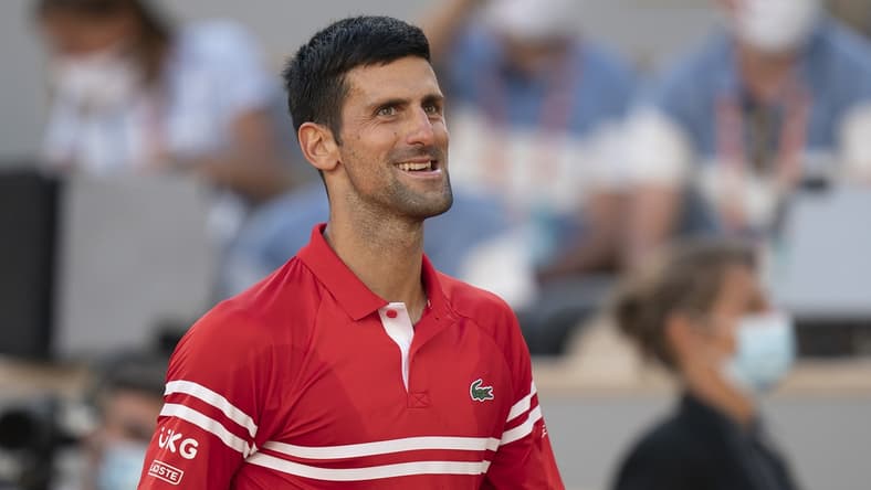 Jun 13, 2021; Paris, France; Novak Djokovic (SRB) celebrates winning the men's final against Stefanos Tsitsipas (GRE) on day 15 of the French Open at Stade Roland Garros. Mandatory Credit: Susan Mullane-USA TODAY Sports