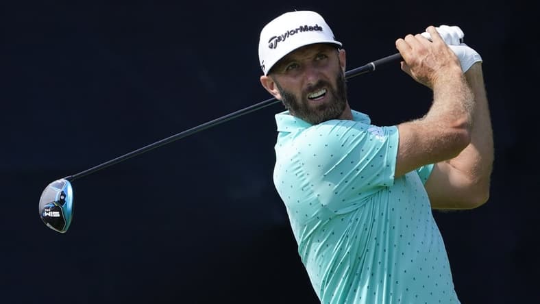 Jun 16, 2021; San Diego, California, USA; Dustin Johnson hits his tee shot on the 7th hole during a practice round of the U.S. Open golf tournament at Torrey Pines. Mandatory Credit: Michael Madrid-USA TODAY Sports