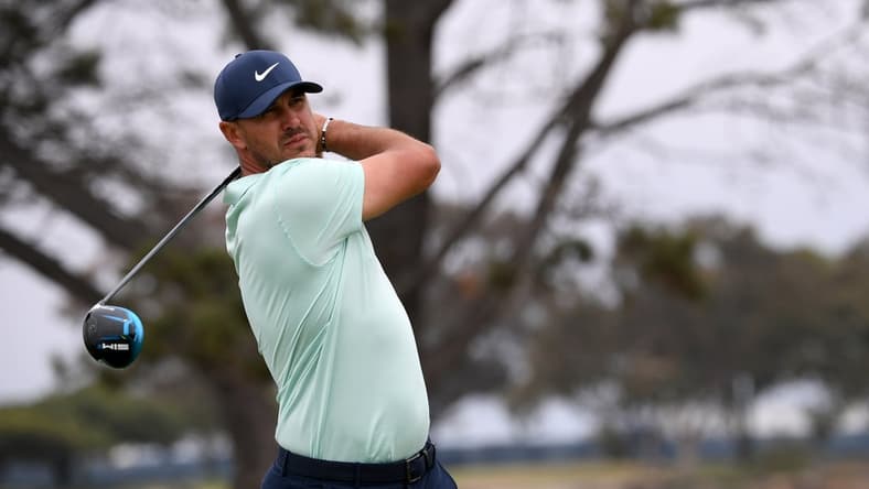 Jun 19, 2021; San Diego, California, USA; Brooks Koepka plays his shot from the fifth tee during the third round of the U.S. Open golf tournament at Torrey Pines Golf Course. Mandatory Credit: Orlando Ramirez-USA TODAY Sports