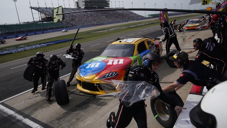 The pit crew for NASCAR Xfinity Series driver Kyle Busch (54) spring into action during the Tennessee Lottery 250 NASCAR Xfinity Series race at the Nashville Superspeedway in Lebanon, Tenn., Saturday, June 19, 2021.

Nascar X 033