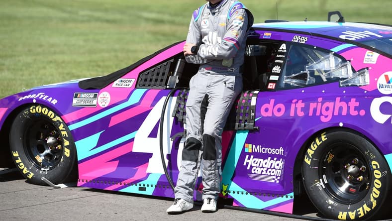Jun 20, 2021; Nashville, Tennessee, USA; NASCAR Cup Series driver Alex Bowman (48) stands beside his car before qualifying for the Ally 400 at Nashville Superspeedway. Mandatory Credit: Christopher Hanewinckel-USA TODAY Sports