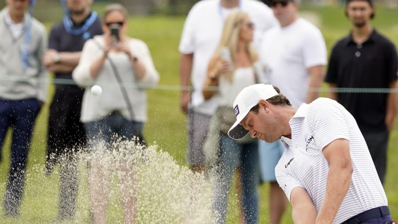 Jun 20, 2021; San Diego, California, USA; Harris English plays a shot from a bunker on the first hole during the final round of the U.S. Open golf tournament at Torrey Pines Golf Course. Mandatory Credit: Michael Madrid-USA TODAY Sports