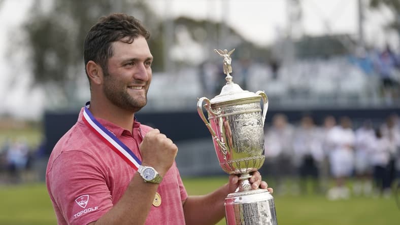 Jun 20, 2021; San Diego, California, USA; Jon Rahm celebrates with the trophy after winning he U.S. Open golf tournament at Torrey Pines Golf Course. Mandatory Credit: Michael Madrid-USA TODAY Sports
