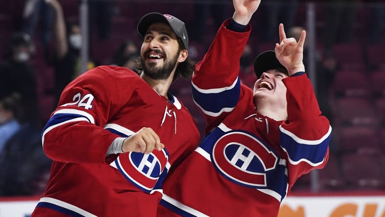 Jun 24, 2021; Montreal, Quebec, CAN; Montreal Canadiens players celebrate after winning game six of the 2021 Stanley Cup Semifinals against the Vegas Golden Knights at the Bell Centre. Mandatory Credit: Eric Bolte-USA TODAY Sports
