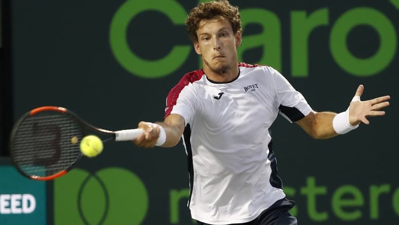 Mar 30, 2018; Key Biscayne, FL, USA; Pablo Carreno Busta of Spain his a forehand against Alexander Zverev of Germany (not pictured) in a men's singles semi-final of the Miami Open at Tennis Center at Crandon Park. Zverev won 6-4, 6-2. Mandatory Credit: Geoff Burke-USA TODAY Sports
