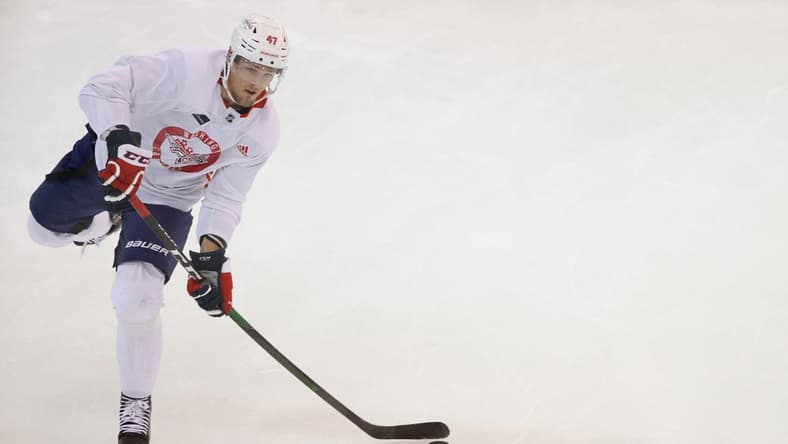 Jul 14, 2020; Arlington, Virginia, USA; Washington Capitals left wing Beck Malenstyn (47) shoots the puck during an NHL workout at MedStar Capitals Iceplex. Mandatory Credit: Geoff Burke-USA TODAY Sports