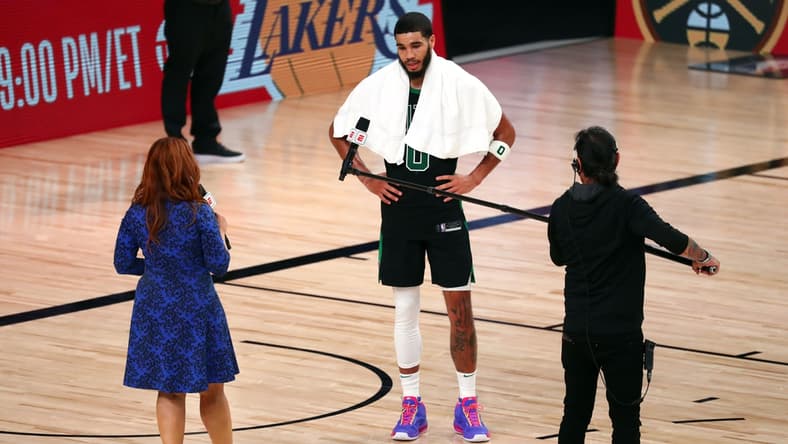 Sep 25, 2020; Lake Buena Vista, Florida, USA; Boston Celtics forward Jayson Tatum (0) is interviewed by sideline reporter Rachel Nichols following game five of the Eastern Conference Finals of the 2020 NBA Playoffs at AdventHealth Arena. Mandatory Credit: Kim Klement-USA TODAY Sports