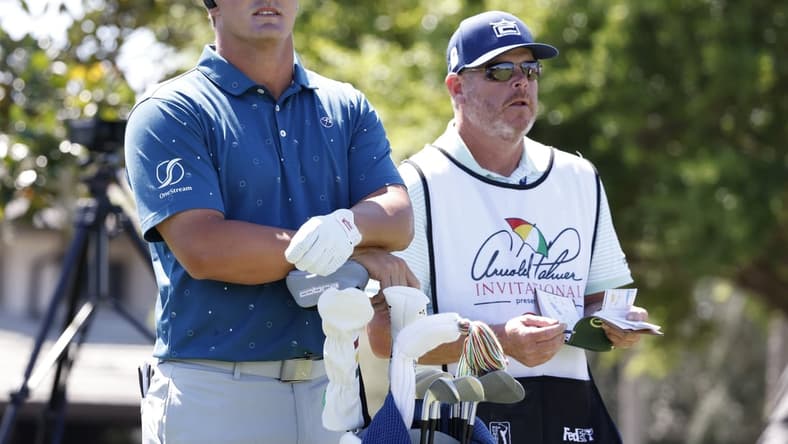 Mar 5, 2021; Orlando, Florida, USA;  Bryson DeChambeau (left) and his caddie Tim Tucker look doiwn the first fairway before the second round of the Arnold Palmer Invitational golf tournament at Bay Hill Club & Lodge. Mandatory Credit: Reinhold Matay-USA TODAY Sports
