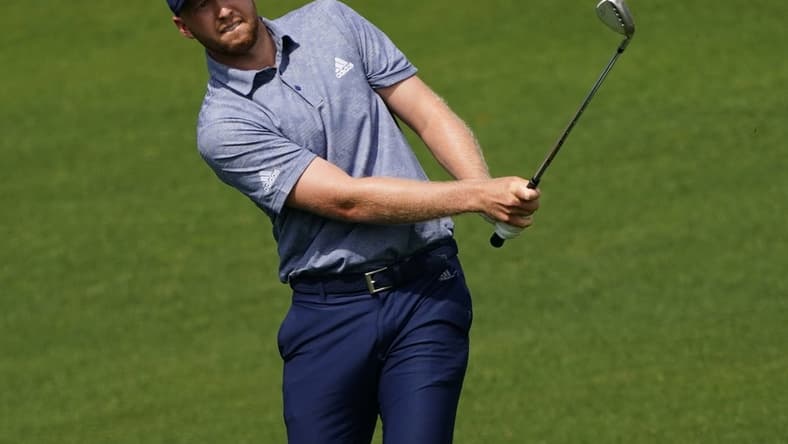 Apr 8, 2021; Augusta, Georgia, USA; Daniel Berger chips onto the 2nd green during the first round of The Masters golf tournament. Mandatory Credit: Michael Madrid-USA TODAY Sports