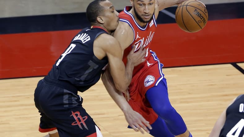 May 5, 2021; Houston, Texas, USA; Philadelphia 76ers guard Ben Simmons, right, drives into Houston Rockets guard Avery Bradley (9) during the first half at Toyota Center. Mandatory Credit: Michael Wyke/POOL PHOTOS-USA TODAY Sports
