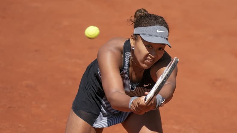 May 30, 2021; Paris, France; Naomi Osaka (JPN) in action during her match against Patricia Maria Tig (ROU) at Roland Garros Stadium. Mandatory Credit: Susan Mullane-USA TODAY Sports