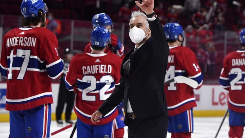 Jun 7, 2021; Montreal, Quebec, CAN; Montreal Canadiens head coach Dominique Ducharme gestures to the fans after the series win over the Winnipeg Jets during the overtime period in game four of the second round of the 2021 Stanley Cup Playoffs at the Bell Centre. Mandatory Credit: Eric Bolte-USA TODAY Sports