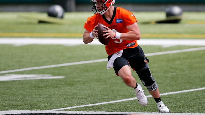Bengals quarterback Joe Burrow scrambles during a minicamp practice at Paul Brown Stadium in Cincinnati on Tuesday.
Cincinnati Bengals Mini Camp