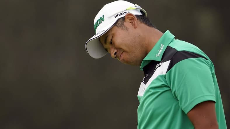 Jun 18, 2021; San Diego, California, USA; Hideki Matsuyama reacts to his putt on the 13th green during the second round of the U.S. Open golf tournament at Torrey Pines Golf Course. Mandatory Credit: Michael Madrid-USA TODAY Sports