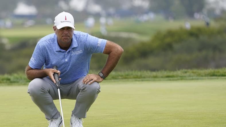 Jun 18, 2021; San Diego, California, USA; Stewart Cink lines up a putt on the 13th green during the second round of the U.S. Open golf tournament at Torrey Pines Golf Course. Mandatory Credit: Michael Madrid-USA TODAY Sports