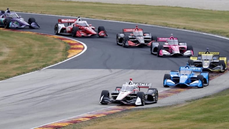 Josef Newgarden (2) leads a pack of cars through turn 1 during the NTT IndyCar Rev Group Grand Prix, Sunday, June 20, 2021, at Elkhart Lake's Road America near Plymouth, Wis.
She 062021 Rev Group Grand Prix Road America Gck 008