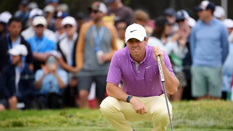 Jun 20, 2021; San Diego, California, USA; Rory McIlroy lines up a putt on the 11th green during the final round of the U.S. Open golf tournament at Torrey Pines Golf Course. Mandatory Credit: Orlando Ramirez-USA TODAY Sports