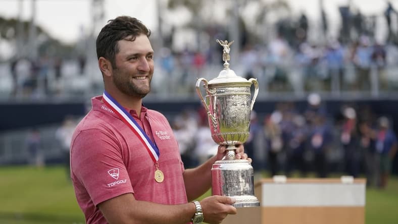 Jun 20, 2021; San Diego, California, USA; Jon Rahm celebrates with the trophy after winning he U.S. Open golf tournament at Torrey Pines Golf Course. Mandatory Credit: Michael Madrid-USA TODAY Sports