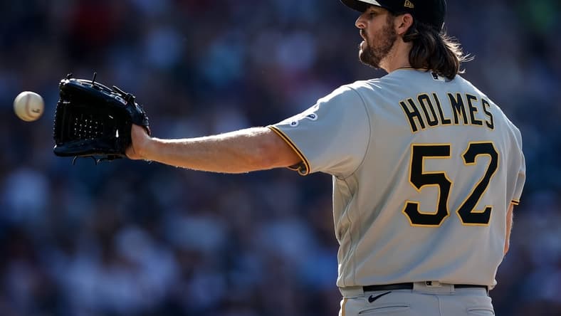 Jun 28, 2021; Denver, Colorado, USA; Pittsburgh Pirates relief pitcher Clay Holmes (52) catches a return ball in the sixth inning against the Colorado Rockies at Coors Field. Mandatory Credit: Isaiah J. Downing-USA TODAY Sports