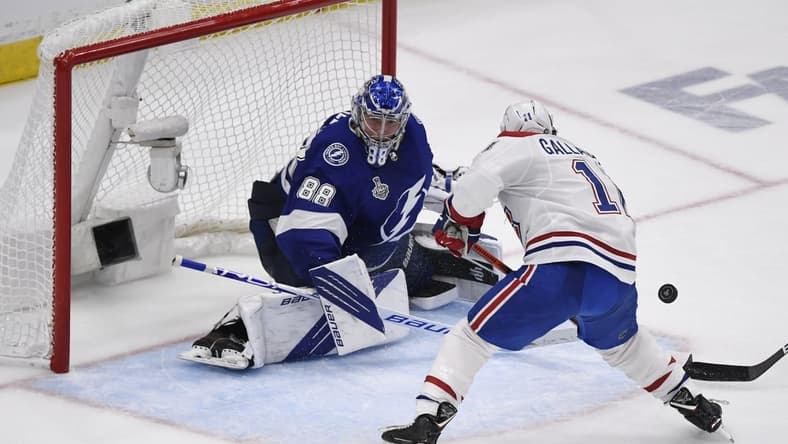 Jun 30, 2021; Tampa, Florida, USA; Tampa Bay Lightning goaltender Andrei Vasilevskiy (88) makes a save against Montreal Canadiens right wing Brendan Gallagher (11) during the third period in game two of the 2021 Stanley Cup Final at Amalie Arena. Mandatory Credit: Douglas DeFelice-USA TODAY Sports