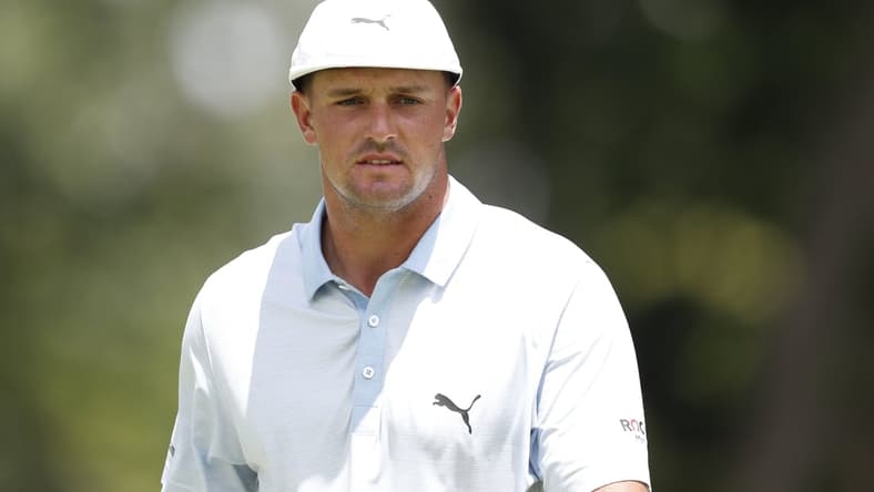 Jul 2, 2021; Detroit, Michigan, USA; Bryson DeChambeau walks on the 9th green during the second round of the Rocket Mortgage Classic golf tournament. Mandatory Credit: Raj Mehta-USA TODAY Sports
