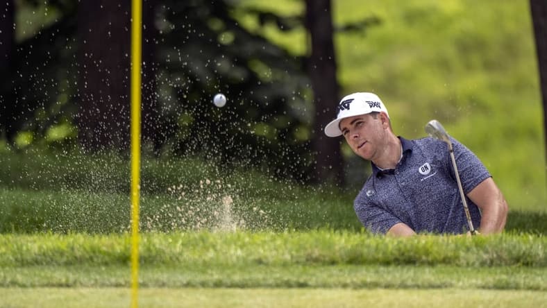 Jul 9, 2021; Silvis, Illinois, USA; Luke List hits a shot out of the bunker onto the 9th green during the second round of the John Deere Classic golf tournament. Mandatory Credit: Marc Lebryk-USA TODAY Sports